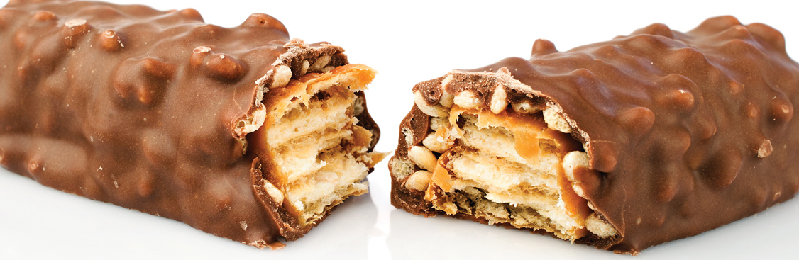 Close-up of streaming melted milk chocolate
