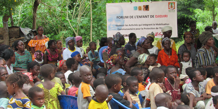 Group of people gathered with children in Africa